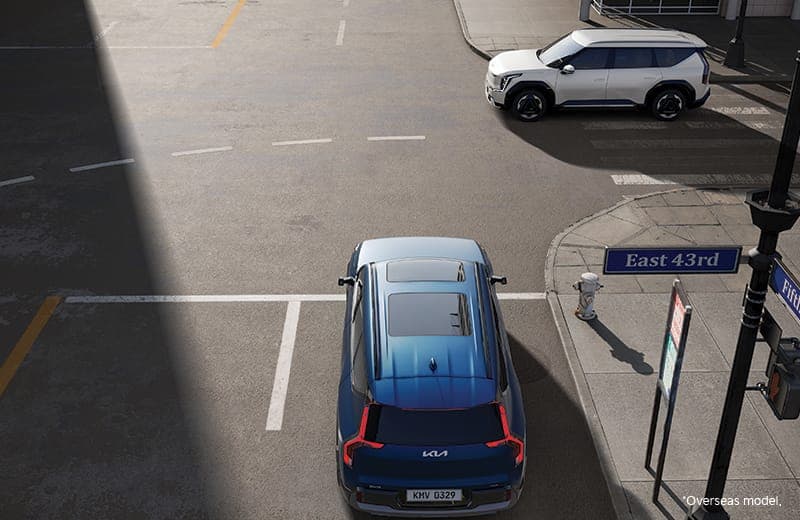 Kia EV9 GT-Line AWD electric SUV exterior, front three-quarter view.